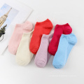 Calcetines tobilleros de algodón liso para mujer